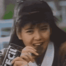 Yoko Minamino Eating GIF - Yoko Minamino Eating Eating Chocolate GIFs