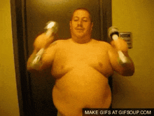a man without a shirt is holding a pair of slippers in front of a sign that says krsh