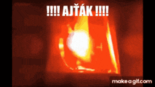 a red background with the words ajtak in white letters