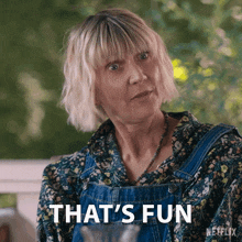 a woman in overalls says that 's fun in a netflix advertisement