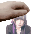 a pixel art of a hand reaching out towards a girl with purple hair .