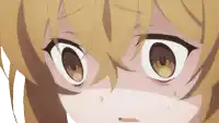 a close up of a girl 's face with a tear running down her face