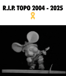 a black and white photo of topo playing a guitar with the words r.i.p. topo 2004 - 2025