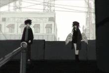a man and a woman are standing in front of a building that says tokyo on it