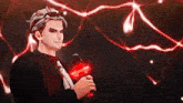 a man in a suit and tie is holding a red object in his hand