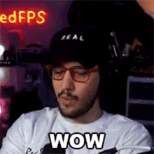 a man wearing a hat and glasses says wow in front of a neon sign that says edfps