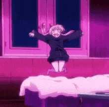 a girl is jumping in the air in front of a window .