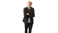 a man in a suit with his arms crossed