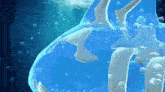 a shark is swimming in the water with bubbles around it