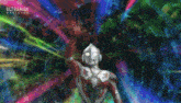 a cartoon character is standing in front of a colorful background and holding a light in his hand .