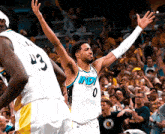 a basketball player wearing a white jersey with the word indiana on it