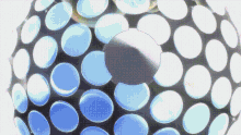 a blue and white sphere with circles on it