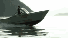 Michael Vartan Speedboat GIF - Michael Vartan Speedboat Phone Call GIFs