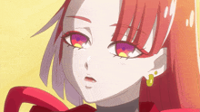 a close up of a girl 's face with red hair