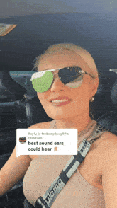 a woman wearing sunglasses has a reply to foxbodydoug89 's comment