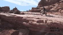 cliff riding stunt motorcycle cyclist