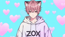 a boy wearing a hoodie that says zox
