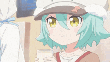 a girl with green hair is holding a glass of milk in her hand .