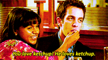 a man and a woman are sitting at a table and the woman says " you love ketchup "