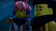 a man and a woman are standing next to each other in a dark room
