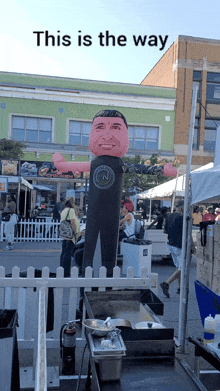 a picture of a man 's face on a balloon with the caption this is the way