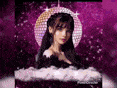 a woman in a black dress is standing in front of a disco ball and clouds .