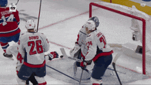 a hockey player with the number 26 on their jersey
