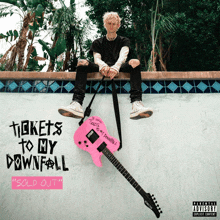 an album cover for tickets to my downfall shows a man sitting on a wall with a pink guitar