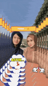 a picture of a man and a woman with a speech bubble saying asyik