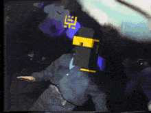 a pixelated image of a person with a yellow e on their face