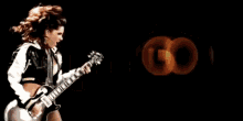 a man in a white shirt is standing in front of a sign that says girl
