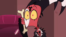 a cartoon character is holding a bone in his mouth