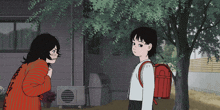a girl with a red backpack talks to a woman