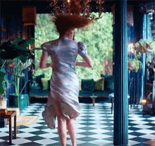 Florence And The Machine Dramatic Dance GIF - Florence And The Machine Dramatic Dance Spin GIFs