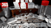 a stack of silver coins with a jm johnson matthew coin in the background