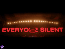 a large red screen with the word silent written on it