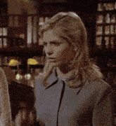 a woman says " i have a really bad idea " in front of a library