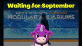 an advertisement for modular aquariums with a stuffed animal