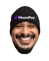 a man wearing a black beanie with moonpay on it