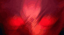a close up of a person 's eyes with red lights