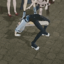 a group of anime characters are dancing on the street