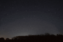a night sky with the constellation virgo and spica visible