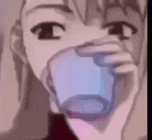 a close up of a person covering their mouth with a glass .