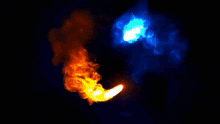 a blue and orange flame coming out of a circle