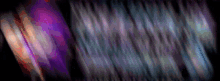 a blurred image of a purple and blue light
