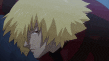 a close up of a cartoon character 's face with yellow hair