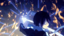 a person is holding a sword in a dark room with a lot of lights coming out of it .