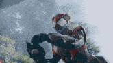 a man in a costume with a helmet that says ' samurai ' on it is holding a sword