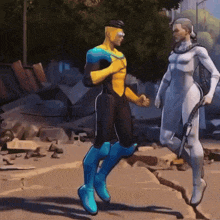 a man in a yellow and black suit and a woman in a white suit are walking
