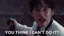 a man with blood on his face and the words " you think i can 't do it " below him